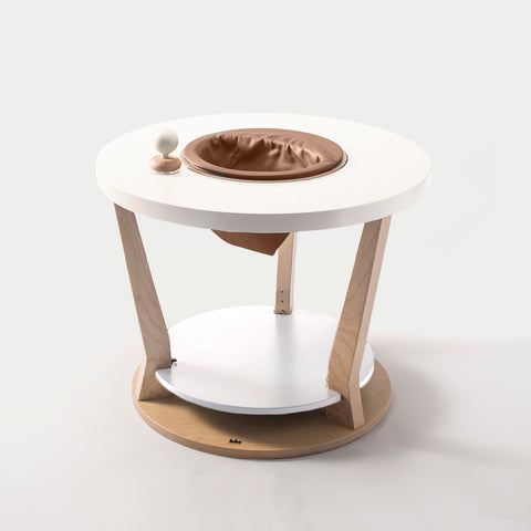 Wooden infant activity center changes from a baby activity center to a toddler play table to a kid's table.  Wooden design disassembles easily and stows neatly away until next time.   This furniture piece is a beautiful addition to any modern nursery.   Toys can be purchased to keep your little one entertained!